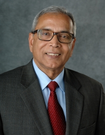 Headshot of man in tie